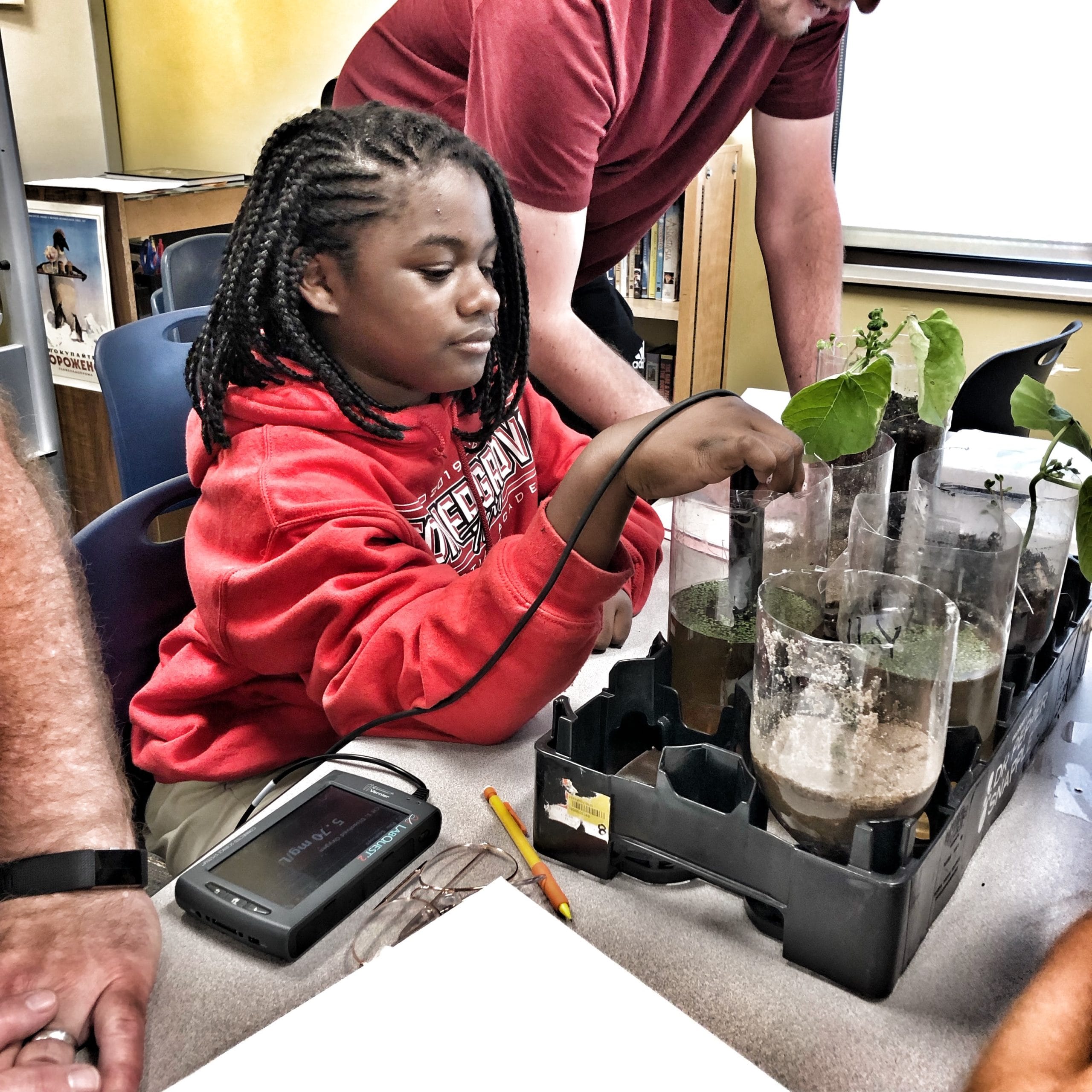 A student measures water quality